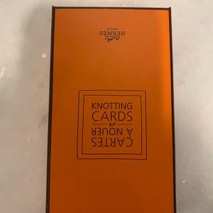 Hermes knotting cards.